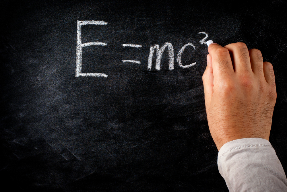 Chalkboard with Albert Einstein formula for theory of relativity